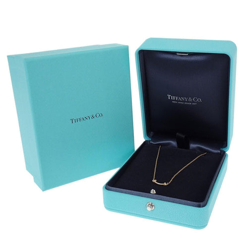 Pendentif Tiffany & Co. T Smile - Pendentif en or jaune et diamants 58 Facettes h7ew21j6cx