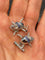 Boutons de manchette Boutons de manchette - Têtes de mort en or gris 18k saphirs et diamants 58 Facettes 180109/26