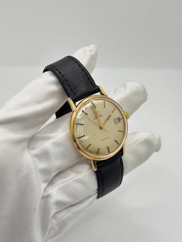 Montre Omega Genève - Montre automatique en or jaune 18K 58 Facettes 1793