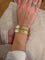 Bracelet Bracelet vintage à maille ruban en or jaune 18 ct 58 Facettes Bracciale vintage maglia a nastro