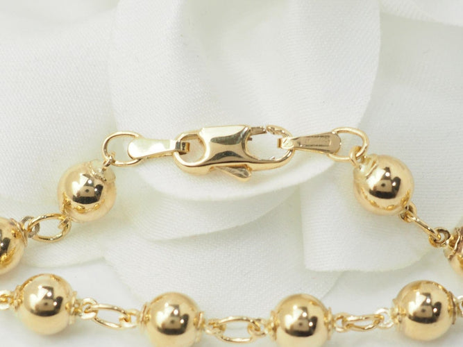 Bracelet Bracelet marseillais boules en or jaune 18 ct 58 Facettes 33372