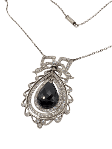 Pendentif Pendentif nœud Belle Époque en or jaune 750, saphir briolette 11 ct et diamants 58 Facettes Collier O2366