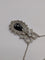 Pendentif Pendentif nœud Belle Époque en or jaune 750, saphir briolette 11 ct et diamants 58 Facettes Collier O2366