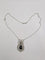 Pendentif Pendentif nœud Belle Époque en or jaune 750, saphir briolette 11 ct et diamants 58 Facettes Collier O2366