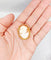 Broche Broche camée sur coquille en or jaune 18k, jeune fille (circa 1930) 58 Facettes A06989