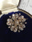 Broche Broche fleur ancienne en or rose 18K, argent et diamants 58 Facettes 256