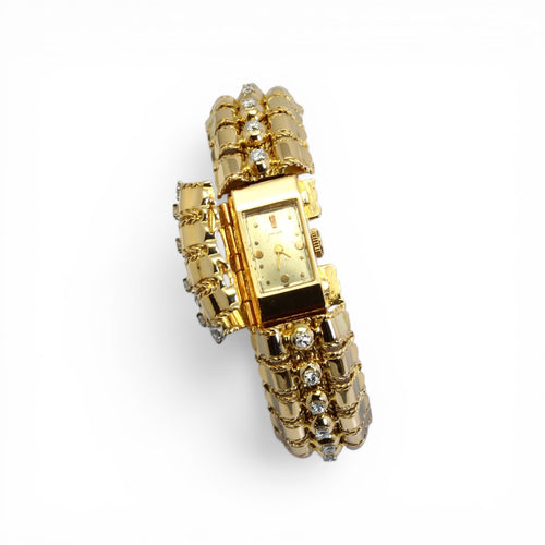 Montre Lacloche - Montre bracelet secrète en or jaune et diamants 58 Facettes
