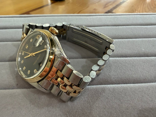Montre Rolex Oyster Perpetual Date - Montre 34 mm en or 750 et acier (vers 1960) 58 Facettes Rol01