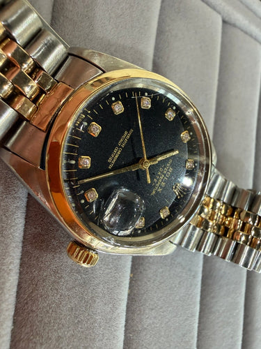 Montre Rolex Oyster Perpetual Date - Montre 34 mm en or 750 et acier (vers 1960) 58 Facettes Rol01