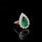 Bague 58 Bague entourage - Émeraude poire 4 ct et diamants en or jaune 58 Facettes UN-0643