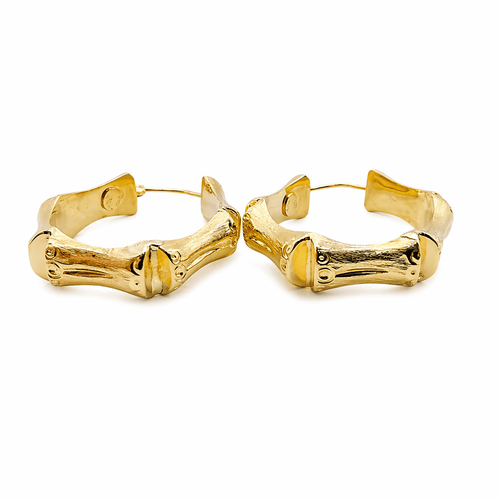 Boucles d'oreilles Boucles d’oreilles créoles maille bambou en or jaune 18 carats 58 Facettes Boucles d'oreilles créoles bambous en or