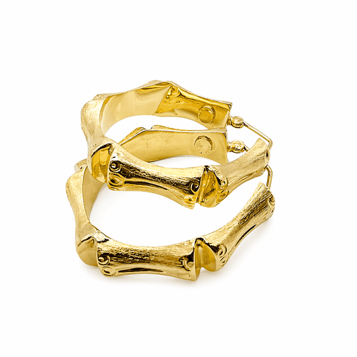 Boucles d'oreilles Boucles d’oreilles créoles maille bambou en or jaune 18 carats 58 Facettes Boucles d'oreilles créoles bambous en or
