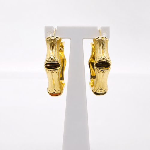 Boucles d'oreilles Boucles d’oreilles créoles maille bambou en or jaune 18 carats 58 Facettes Boucles d'oreilles créoles bambous en or