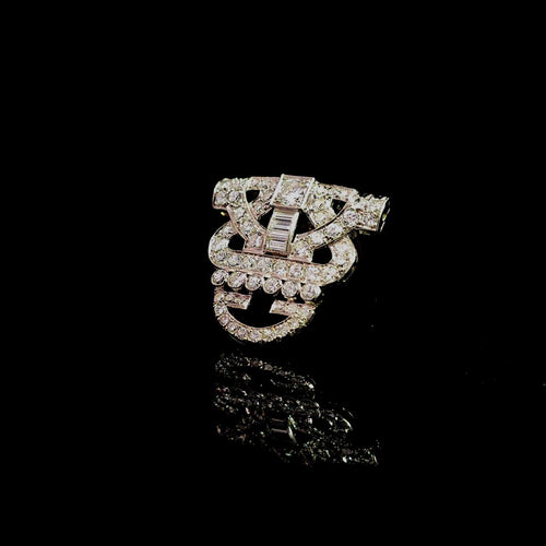 Broche Art déco - Broche géométrique ajourée en platine et diamants 58 Facettes 60024059