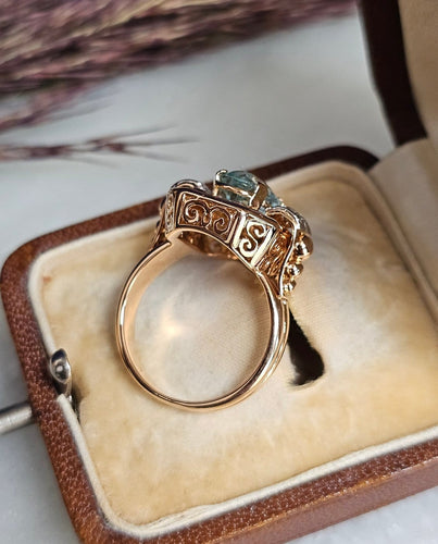 Bague 52 Bague cocktail vintage en or rose 18 carats, aigue-marine et diamants 58 Facettes 640