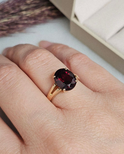 Bague 55 Bague solitaire en or jaune 14 carats et grenat ovale 58 Facettes 725
