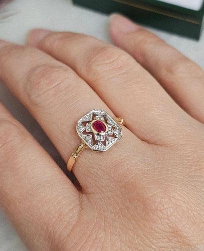 Bague 60 Bague vintage Art déco en or jaune et blanc 18 ct rubis et diamants 58 Facettes 720