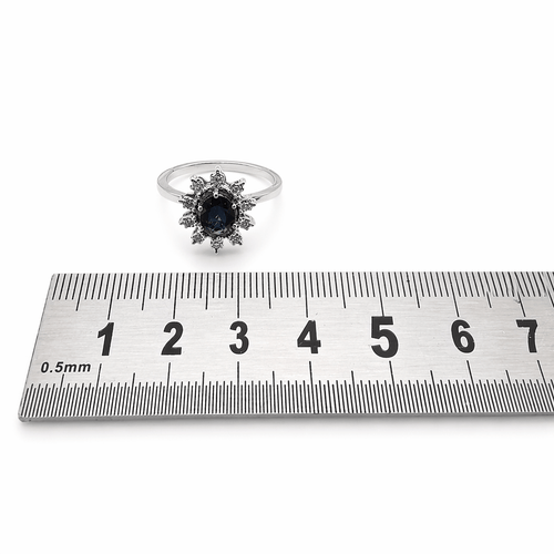 Bague 53 Bague marguerite en or blanc 18 carats, saphir et diamants 58 Facettes Bague marguerite en or saphir et diamants