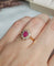 Bague 50 Bague marguerite rubis et diamants en or jaune 18 carats 58 Facettes 723
