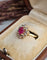 Bague 50 Bague marguerite rubis et diamants en or jaune 18 carats 58 Facettes 723