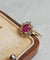 Bague 50 Bague marguerite rubis et diamants en or jaune 18 carats 58 Facettes 723