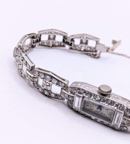 Montre Montre Art déco en or gris 18k et diamants 58 Facettes O817