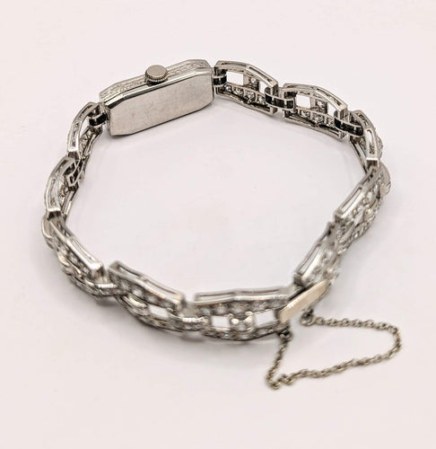 Montre Montre Art déco en or gris 18k et diamants 58 Facettes O817