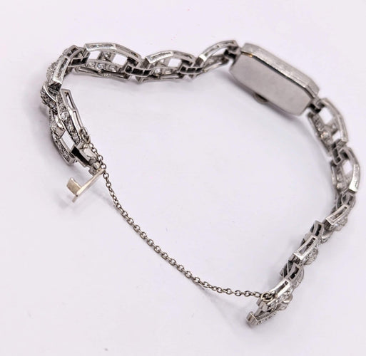Montre Montre Art déco en or gris 18k et diamants 58 Facettes O817