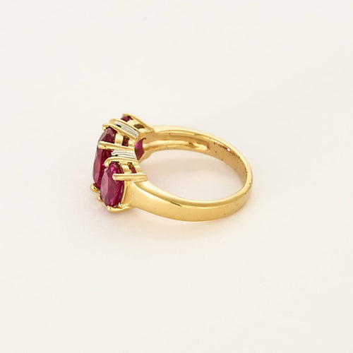 Bague 50 Bague jarretière en or jaune et or gris, rubis de synthèse 58 Facettes 260252