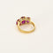 Bague 50 Bague jarretière en or jaune et or gris, rubis de synthèse 58 Facettes 260252