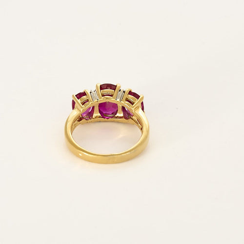 Bague 50 Bague jarretière en or jaune et or gris, rubis de synthèse 58 Facettes 260252