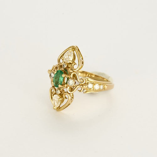 Bague 53 Bague marquise en or jaune, émeraude et diamants 58 Facettes 260286