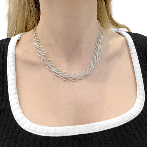 Collier Collier "Palmes" or blanc, diamants. 58 Facettes 35550