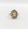 Bague 43 Bague marguerite antique en or 18k et platine, topaze et diamants 58 Facettes A06590
