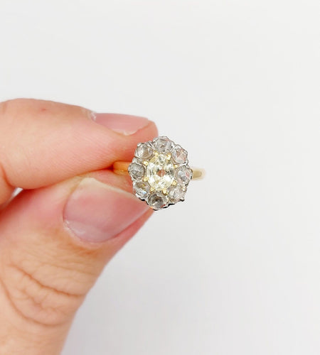 Bague 43 Bague marguerite antique en or 18k et platine, topaze et diamants 58 Facettes A06590