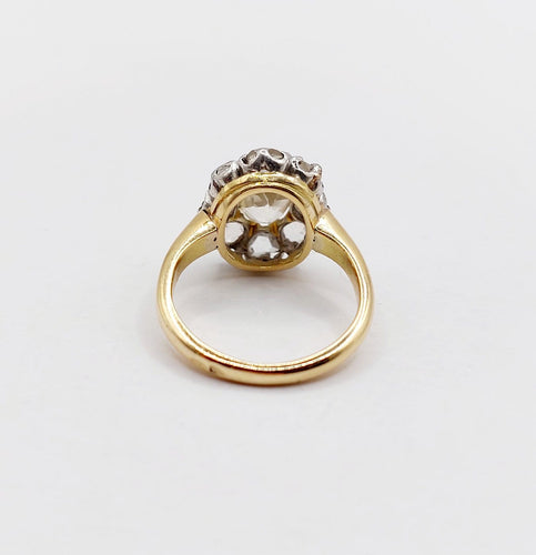 Bague 43 Bague marguerite antique en or 18k et platine, topaze et diamants 58 Facettes A06590