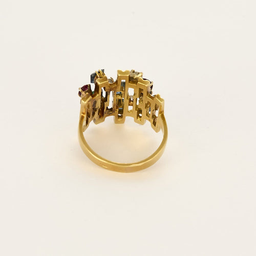 Bague 53 Bague moderniste en or jaune, diamants, rubis, émeraudes et saphirs 58 Facettes B260053