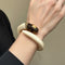 Bracelet Bracelet jonc animalier en ivoire et or jaune 18 carats 58 Facettes 1057/09