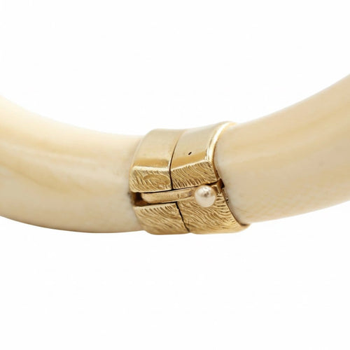 Bracelet Bracelet jonc animalier en ivoire et or jaune 18 carats 58 Facettes 1057/09