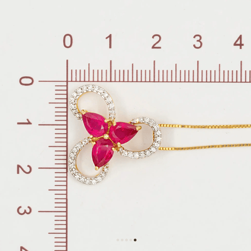 Pendentif Pendentif en or 18K avec diamants 0,52 ct et rubis 2,00 ct 58 Facettes BX02