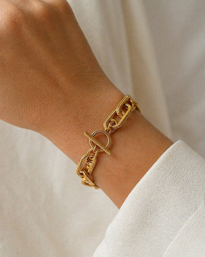 Bracelet Bracelet chaîne en or jaune 18 carats avec fermoir toggle 58 Facettes Cor