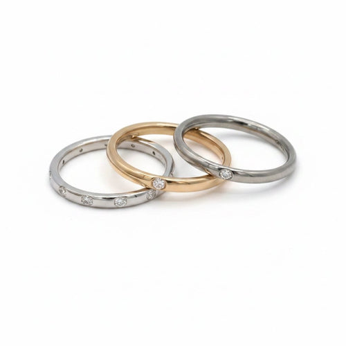 Bague 55 Pomellato Lucciole - Trio de bagues en titane, or rose et or blanc avec diamants 58 Facettes 1.0001455/1
