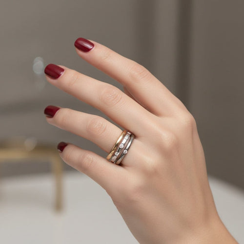 Bague 55 Pomellato Lucciole - Trio de bagues en titane, or rose et or blanc avec diamants 58 Facettes 1.0001455/1
