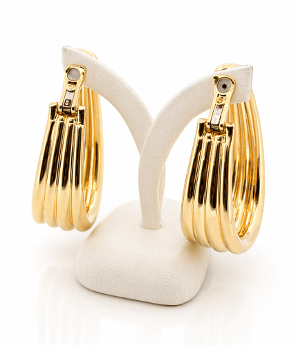 Boucles d'oreilles Boucheron - Boucles d’oreilles vintage en or jaune 18 carats 58 Facettes Bou