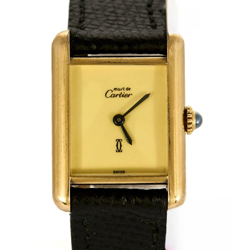 Montre Cartier Tank Must - Montre en argent plaqué or, cadran crème 58 Facettes A1179