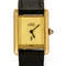 Montre Cartier Tank Must - Montre en argent plaqué or, cadran crème 58 Facettes A1179
