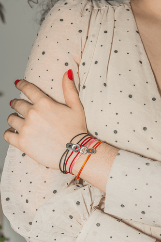Bracelet Dodo Pomellato Bracelet Cordon Bouton Argent 58 Facettes 3661096CN
