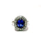 Bague Bague halo en or blanc 18k avec tourmaline bleue et diamants 58 Facettes 50451