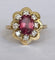 Bague 52 Bague cocktail entourage en or jaune 18 ct avec grenat et diamants 58 Facettes ring