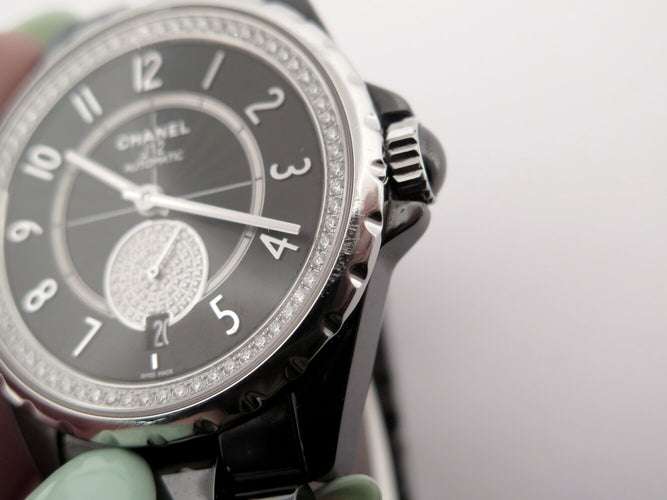 Montre Chanel J12-365 H3840 - Montre automatique en céramique noire sertie de diamants 58 Facettes 274462
